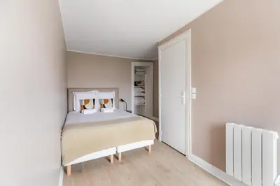 Un ou plusieurs lits dans un hébergement de l'établissement Charming bright T2 in Le Marais & Bastille on foot