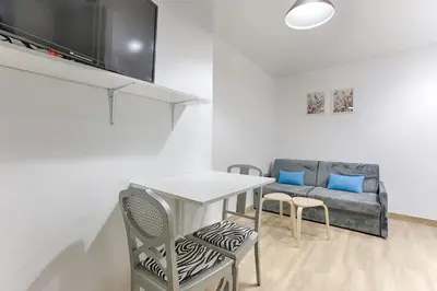 Télévision ou salle de divertissement dans l'établissement Studio au coeur du Marais