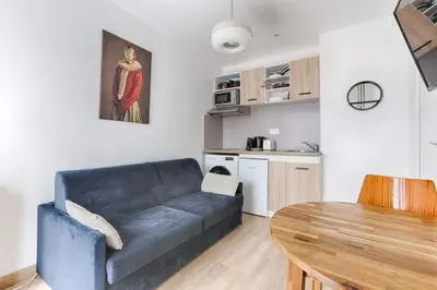 Cuisine ou kitchenette dans l'établissement Appartement Cosy au coeur du Marais