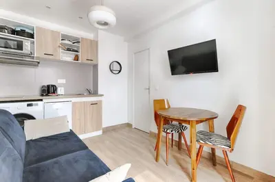 Cuisine ou kitchenette dans l'établissement Appartement Cosy au coeur du Marais