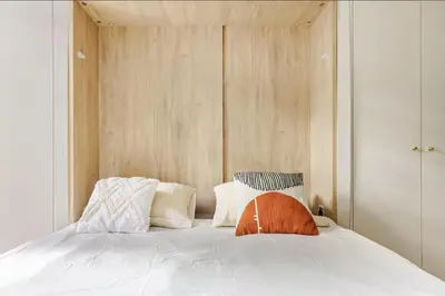 Un ou plusieurs lits dans un hébergement de l'établissement Passy Chic Studio & Absolute Calm