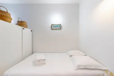 Un ou plusieurs lits dans un hébergement de l'établissement GuestReady - Cosy studio for 2 - Exhibition Centre