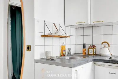 Cuisine ou kitchenette dans l'établissement Studio d'Elegance au Coeur du Marais