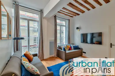 Coin salon dans l'établissement UrbanFlat 98 - Large Apartment in the center of Paris