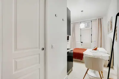 Un ou plusieurs lits dans un hébergement de l'établissement Charming Studio 2P Canal Saint-Martin - Republique