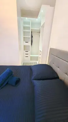 Un ou plusieurs lits dans un hébergement de l'établissement APPARTEMENT TOUT NEUF QUARTIER TOUR EIFFEL, INVALIDES et TROCADERO
