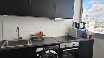 Cuisine ou kitchenette dans l'établissement Big apt for 10p parking free close station metro