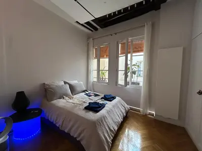 Un ou plusieurs lits dans un hébergement de l'établissement Le Marais à Paris - Appartement d'artiste