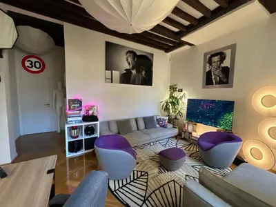 Coin salon dans l'établissement Le Marais à Paris - Appartement d'artiste