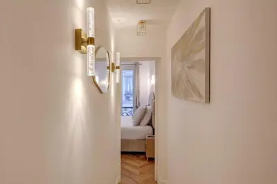 Un ou plusieurs lits dans un hébergement de l'établissement TBS 204 - Prestigious suite near Champs-Élysées