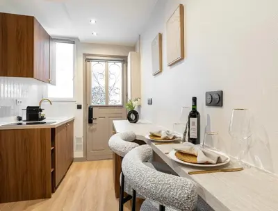 Cuisine ou kitchenette dans l'établissement Stunning studio - Montparnasse