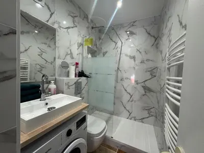 Salle de bains dans l'établissement New studio apartment hotel Palais des Congrès 11