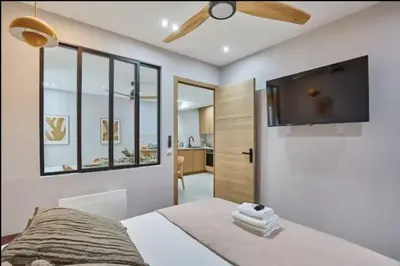 Un ou plusieurs lits dans un hébergement de l'établissement Superb 3-bedroom8-person apartment near Bois de Vincennes