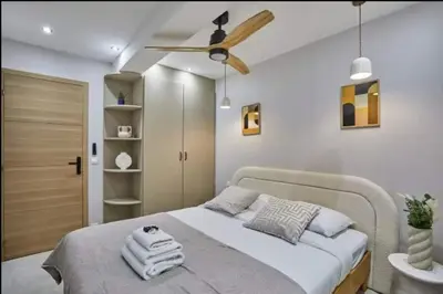 Un ou plusieurs lits dans un hébergement de l'établissement Superb 3-bedroom8-person apartment near Bois de Vincennes
