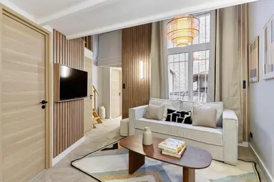 Télévision ou salle de divertissement dans l'établissement Superb 3-bedroom flat near the Moulin Rouge and Montmartre