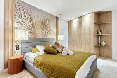 Un ou plusieurs lits dans un hébergement de l'établissement Superb 3-bedroom flat near the Moulin Rouge and Montmartre