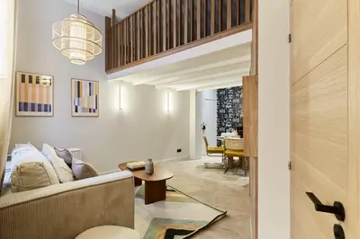 Coin salon dans l'établissement Superb 3-bedroom flat near the Moulin Rouge and Montmartre
