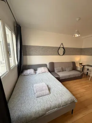 Un ou plusieurs lits dans un hébergement de l'établissement Studio Gare de Lyon Bercy PARIS