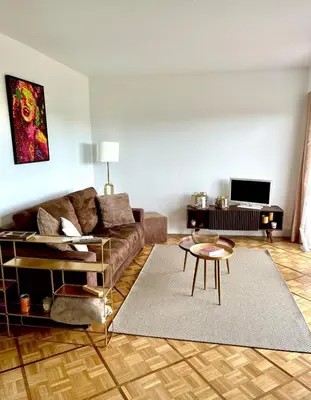 Coin salon dans l'établissement Appartement chaleureux Belle vue Proche de Paris