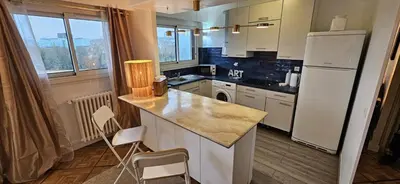 Cuisine ou kitchenette dans l'établissement Appartement chaleureux Belle vue Proche de Paris