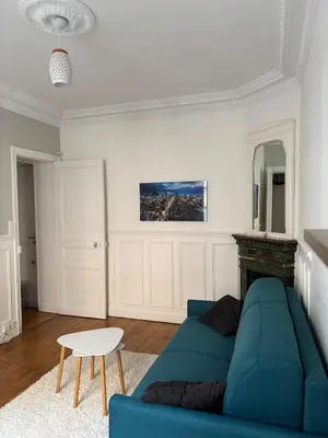 Coin salon dans l'établissement Cozy studio in Paris