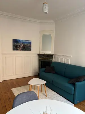 Coin salon dans l'établissement Cozy studio in Paris