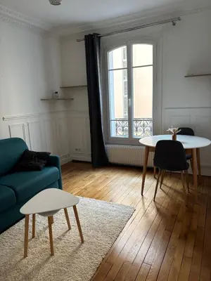 Coin salon dans l'établissement Cozy studio in Paris