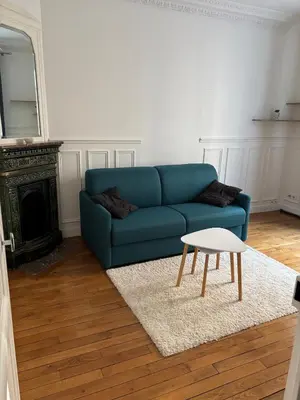 Coin salon dans l'établissement Cozy studio in Paris