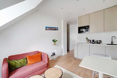 Cuisine ou kitchenette dans l'établissement Comfortable and modern 2P studio - 16th Paris