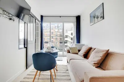 Coin salon dans l'établissement Charming apartment - 2P - Trocadéro
