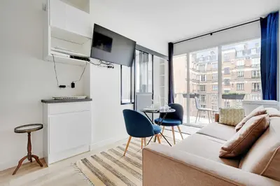 Télévision ou salle de divertissement dans l'établissement Charming apartment - 2P - Trocadéro