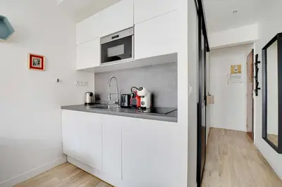 Cuisine ou kitchenette dans l'établissement Charming apartment - 2P - Trocadéro