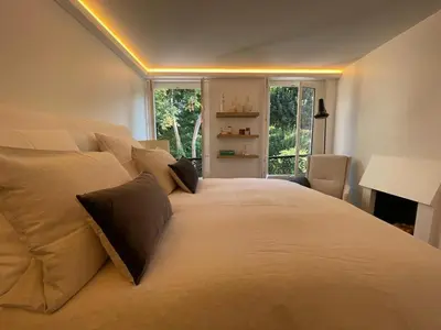 Un ou plusieurs lits dans un hébergement de l'établissement Cozy MONTMARTRE