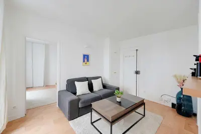 Coin salon dans l'établissement Comfortable Apartment 1BR 2P – Paris 10th
