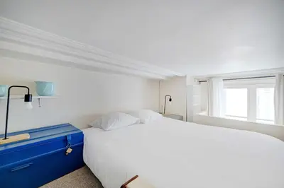 Un ou plusieurs lits dans un hébergement de l'établissement Charming Studio - 2P - Sentier Montorgueil