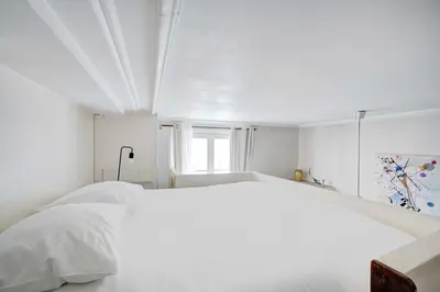 Un ou plusieurs lits dans un hébergement de l'établissement Charming Studio - 2P - Sentier Montorgueil