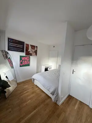 Un ou plusieurs lits dans un hébergement de l'établissement Paris 19 Cozy Stay