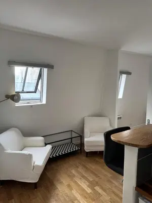 Un ou plusieurs lits dans un hébergement de l'établissement Paris 19 Cozy Stay