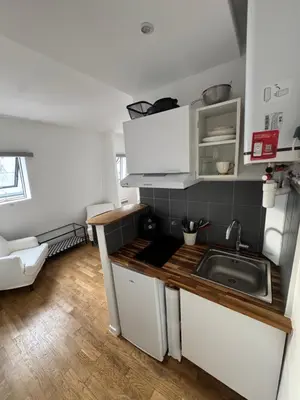 Cuisine ou kitchenette dans l'établissement Paris 19 Cozy Stay