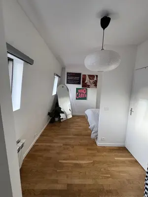 Télévision ou salle de divertissement dans l'établissement Paris 19 Cozy Stay