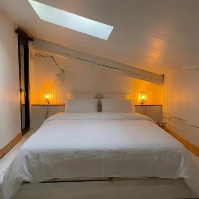 Un ou plusieurs lits dans un hébergement de l'établissement Duplex, grand balcon et sauna