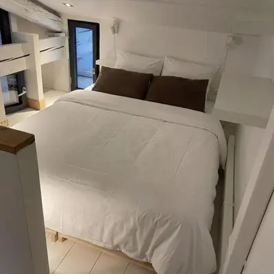 Un ou plusieurs lits dans un hébergement de l'établissement Duplex, grand balcon et sauna