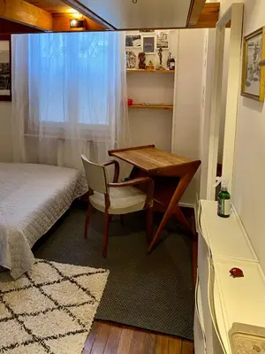 Un ou plusieurs lits dans un hébergement de l'établissement Chambre privée chez l'habitant
