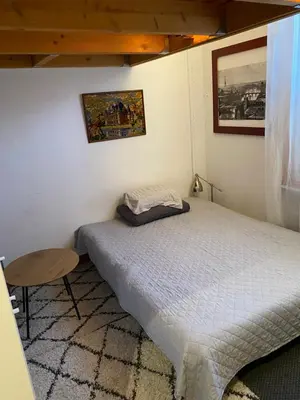 Un ou plusieurs lits dans un hébergement de l'établissement Chambre privée chez l'habitant