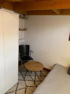 Un ou plusieurs lits dans un hébergement de l'établissement Chambre privée chez l'habitant