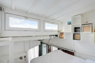 Cuisine ou kitchenette dans l'établissement Spacious apartment 2BR 4P – République