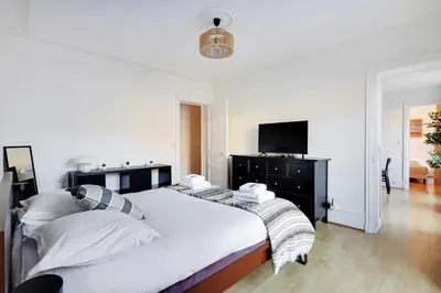 Un ou plusieurs lits dans un hébergement de l'établissement Beautiful apartment - 2BR 4P - Arc de Triomphe