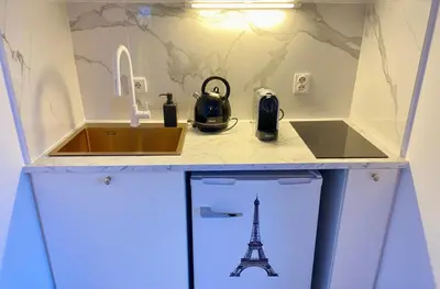 Cuisine ou kitchenette dans l'établissement Tour Eiffel Passy Quai de Seine Paris