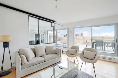 Coin salon dans l'établissement A C 2P apartment with terrace and view of Paris