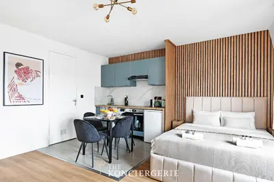 Un ou plusieurs lits dans un hébergement de l'établissement Studio d'Architecte Haut de Gamme - Elegance et Confort - Paris